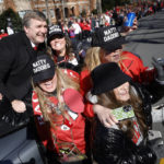 
              Georgia head coach Kirby Smart, left, greets fans during a parade celebrating the Bulldog's second consecutive NCAA college football national championship, Saturday, Jan. 14, 2023, in Athens, Ga. (AP Photo/Alex Slitz)
            