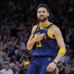
              Golden State Warriors forward Klay Thompson reacts after scoring a 3-point basket against the Memphis Grizzlies during the second half of an NBA basketball game in San Francisco, Wednesday, Jan. 25, 2023. (AP Photo/Godofredo A. Vásquez)
            