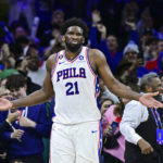 
              Philadelphia 76ers' Joel Embiid reacts after a play duining the second half of an NBA basketball game against the Denver Nuggets, Saturday, Jan. 28, 2023, in Philadelphia. (AP Photo/Derik Hamilton)
            