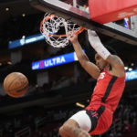 
              Houston Rockets' Kenyon Martin Jr. dunks the ball against the Washington Wizards during the first half of an NBA basketball game Wednesday, Jan. 25, 2023, in Houston. (AP Photo/David J. Phillip)
            