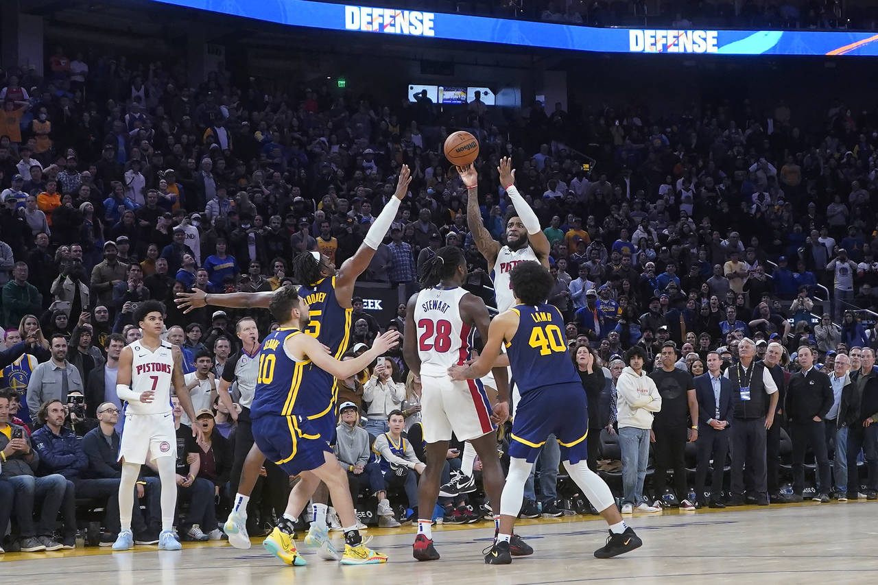 Detroit Pistons forward Saddiq Bey shoots the game-winning 3-point basket against the Golden State ...