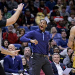 
              New Orleans Pelicans head coach Willie Green, center, yells at referee John Goble, left, resulting in Green's ejection during the second half of the team's NBA basketball game against the Minnesota Timberwolves in New Orleans, Wednesday, Jan. 25, 2023. (AP Photo/Matthew Hinton)
            