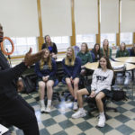 
              Troy Vincent, NFL Executive Vice President of Football Operations, left, talks with students at Mount St. Mary Academy on Wednesday, Jan. 18, 2023, in Kenmore, N.Y. (AP Photo/Joshua Bessex)
            