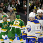 
              Minnesota Wild's Jared Spurgeon (46) and Matt Boldy (12) celebrate as Buffalo Sabres skate away in the second period of an NHL hockey game Saturday, Jan. 28, 2023, in St. Paul, Minn. (AP Photo/Andy Clayton-King)
            