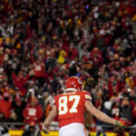 
              Kansas City Chiefs tight end Travis Kelce (87) celebrates his touchdown reception against the Cincinnati Bengals during the first half of the NFL AFC Championship playoff football game, Sunday, Jan. 29, 2023, in Kansas City, Mo. (AP Photo/Brynn Anderson)
            