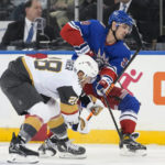 
              Vegas Golden Knights left wing William Carrier (28) competesfor the puck against New York Rangers left wing Chris Kreider (20) during the first period of an NHL hockey game Friday, Jan. 27, 2023, at Madison Square Garden in New York. (AP Photo/Mary Altaffer)
            