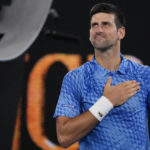 
              Novak Djokovic of Serbia reacts after defeating Roberto Carballes Baena of Spain in their first round match at the Australian Open tennis championship in Melbourne, Australia, Wednesday, Jan. 18, 2023. (AP Photo/Aaron Favila)
            