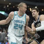 
              Charlotte Hornets' Mason Plumlee drives past Milwaukee Bucks' Brook Lopez during the first half of an NBA basketball game Tuesday, Jan. 31, 2023, in Milwaukee. (AP Photo/Morry Gash)
            