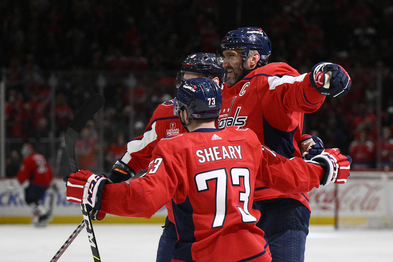 Washington Capitals left wing Alex Ovechkin, right, celebrates his goal against the Pittsburgh Peng...