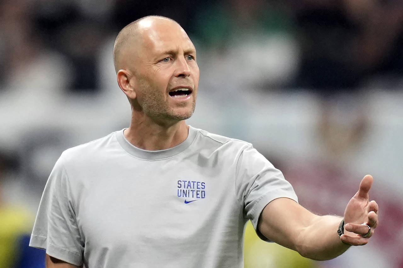 FILE - United States head coach Gregg Berhalter follows the game during the World Cup group B socce...