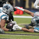 
              Carolina Panthers guard Michael Jordan recovers a fumble for a touchdown during the second half an NFL football game between the Carolina Panthers and the New Orleans Saints in New Orleans, Sunday, Jan. 8, 2023. (AP Photo/Gerald Herbert)
            