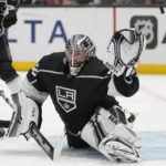 
              Los Angeles Kings goaltender Pheonix Copley (29) deflects a shot during the third period of an NHL hockey game against the Dallas Stars Thursday, Jan. 19, 2023, in Los Angeles. (AP Photo/Ashley Landis)
            