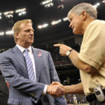 
              FILE - Former NFL coach Les Steckel, right, talks with NFL commissioner Roger Goodell prior to an NFL game between the New York Giants and New Orleans Saints in New Orleans, Sunday, Oct. 18, 2009. Luke Steckel is finishing up his 10th season working with the Tennessee Titans, the very same NFL team that made its lone Super Bowl appearance with his father Les as offensive coordinator. That connection didn't get Luke Steckel into the family business of the NFL. (AP Photo/Bill Feig, File)
            