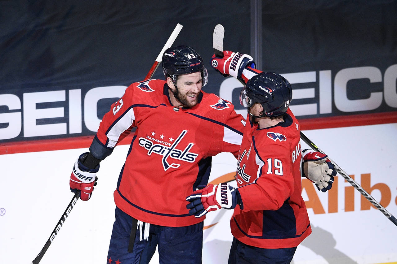 FIEL - Washington Capitals right wing Tom Wilson (43) celebrates his second goal of the game with t...