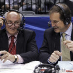 
              FILE - CBS announcers Billy Packer, left, and Jim Nantz laugh during a break in the championship game in the Big Ten basketball tournament in Indianapolis, March 12, 2006. Packer, an Emmy award-winning college basketball broadcaster who covered 34 Final Fours for NBC and CBS, died Thursday night, Jan. 26, 2023. He was 82. Packer's son, Mark, told The Associated Press that his father had been hospitalized in Charlotte, N.C., for the past three weeks and had several medical issues, and ultimately succumbed to kidney failure. (AP Photo/Michael Conroy, File)
            