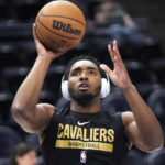 
              Cleveland Cavaliers guard Donovan Mitchell warms up for the team's NBA basketball game against the Utah Jazz on Tuesday, Jan. 10, 2023, in Salt Lake City. (AP Photo/Rick Bowmer)
            