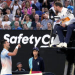 
              Novak Djokovic of Serbia gestures as he argues with chair umpire Damien Dumusois during his semifinal against Tommy Paul of the U.S. at the Australian Open tennis championship in Melbourne, Australia, Friday, Jan. 27, 2023. (AP Photo/Aaron Favila)
            