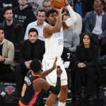 
              Los Angeles Lakers' Rui Hachimura (28), of Japan, shoots over New York Knicks' RJ Barrett (9) during the first half of an NBA basketball game Tuesday, Jan. 31, 2023, in New York. (AP Photo/Frank Franklin II)
            