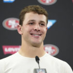 
              San Francisco 49ers quarterback Brock Purdy speaks at a news conference after an NFL divisional playoff football game against the Dallas Cowboys in Santa Clara, Calif., Sunday, Jan. 22, 2023. (AP Photo/Godofredo A. Vásquez)
            