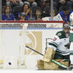 
              Minnesota Wild goaltender Marc-Andre Fleury and defenseman Jared Spurgeon (46) tend net against the New York Rangers during the first period of an NHL hockey game, Tuesday, Jan. 10, 2023, at Madison Square Garden in New York. (AP Photo/Mary Altaffer)
            