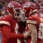 
              Kansas City Chiefs tight end Travis Kelce (87) celebrates his touchdown with quarterback Chad Henne (4) against the Jacksonville Jaguarsduring the first half of an NFL divisional round playoff football game, Saturday, Jan. 21, 2023, in Kansas City, Mo. (AP Photo/Ed Zurga)
            