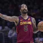 
              FILE - Cleveland Cavaliers' JR Smith gestures to teammates during the first half of an NBA basketball game against the Philadelphia 76ers, April 6, 2018, in Philadelphia. Smith hopes his journey to become a college golfer helps others feel comfortable taking up the sport regardless of their background. Smith is part of a new video podcast launching Wednesday designed to make the sport more accessible to young and diverse audiences. (AP Photo/Chris Szagola, File)
            