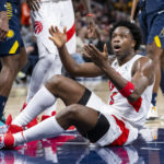 
              Toronto Raptors forward O.G. Anunoby reacts after being called for a foul during the second half of an NBA basketball game against the Indiana Pacers in Indianapolis, Monday, Jan. 2, 2023. (AP Photo/Doug McSchooler)
            