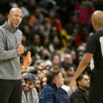 
              Phoenix Suns head coach Monty Williams, left, reacts to referee CJ Washington (12) during the first half of an NBA basketball game against the Washington Wizards, Wednesday, Dec. 28, 2022, in Washington. (AP Photo/Nick Wass)
            