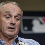 
              Major League Baseball Commissioner Robert Dean Manfred Jr. answers questions at spring training media day Wednesday, Feb. 15, 2023, in Phoenix. (AP Photo/Morry Gash)
            