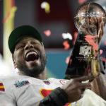 
              Kansas City Chiefs defensive end Carlos Dunlap celebrates with the Vince Lombardi Trophy after the NFL Super Bowl 57 football game, Sunday, Feb. 12, 2023, in Glendale, Ariz. The Kansas City Chiefs defeated the Philadelphia Eagles 38-35. (AP Photo/Ashley Landis)
            