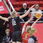 
              Stanford forward Cameron Brink (22) blocks the shot of Utah guard Gianna Kneepkens (5) in the first half of an NCAA college basketball game Saturday, Feb. 25, 2023, in Salt Lake City. (AP Photo/Rob Gray)
            