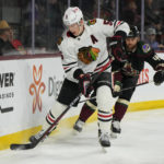 
              Chicago Blackhawks defenseman Connor Murphy skates away from Arizona Coyotes right wing Zack Kassian in the first period during an NHL hockey game, Tuesday, Feb. 28, 2023, in Tempe, Ariz. (AP Photo/Rick Scuteri)
            