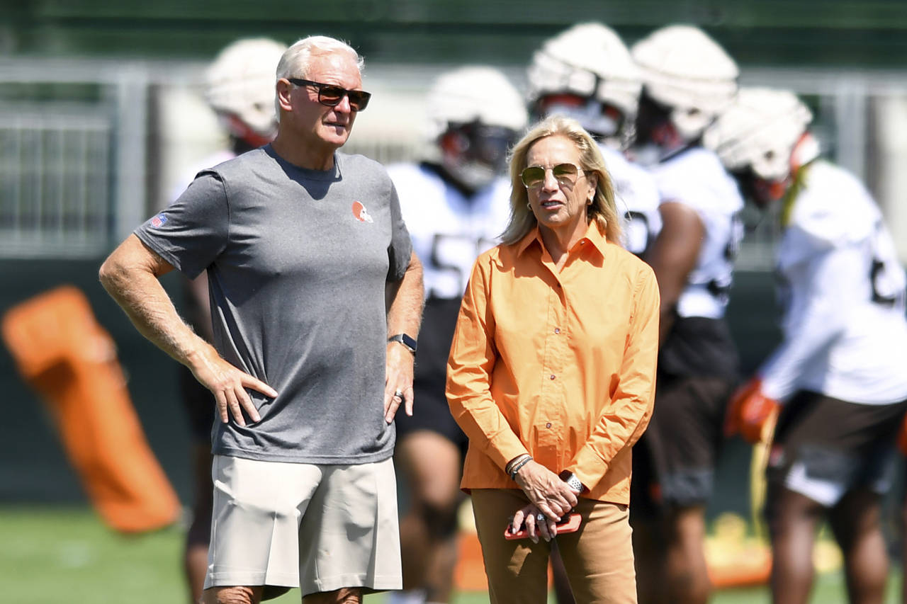 FILE - Cleveland Browns owners Jimmy, left, and Dee Haslam look on during the NFL football team's t...