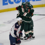 
              Columbus Blue Jackets right wing Kirill Marchenko (86) reacts after an overtime loss to the Minnesota Wild in an NHL hockey game Sunday, Feb. 26, 2023, in St. Paul, Minn. (AP Photo/Abbie Parr)
            