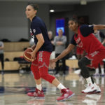 
              Diana Taurasi, left, and Angel McCoughtry take part in drills during a minicamp for the U.S women's national basketball team, Tuesday, Feb. 7, 2023, in Minneapolis. (AP Photo/Abbie Parr)
            