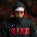 
              Portland Trail Blazers guard Gary Payton II stands for "Lift Every Voice and Sing" before an NBA basketball game against the Chicago Bulls Saturday, Feb. 4, 2023, in Chicago. (AP Photo/Erin Hooley)
            
