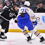 
              Los Angeles Kings right wing Adrian Kempe, left, shoots to score against Buffalo Sabres defenseman Owen Power during the second period of an NHL hockey game in Los Angeles, Monday, Feb. 13, 2023. (AP Photo/Alex Gallardo)
            