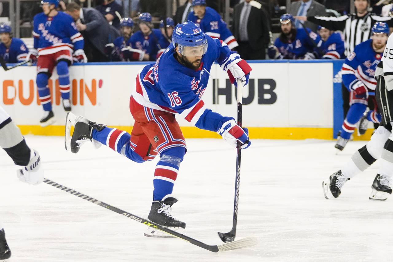 New York Rangers' Vincent Trocheck shoots a goal during the second period of an NHL hockey game aga...