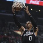 
              Los Angeles Clippers guard Russell Westbrook shoots during the first half of an NBA basketball game against the Sacramento Kings Friday, Feb. 24, 2023, in Los Angeles. (AP Photo/Mark J. Terrill)
            