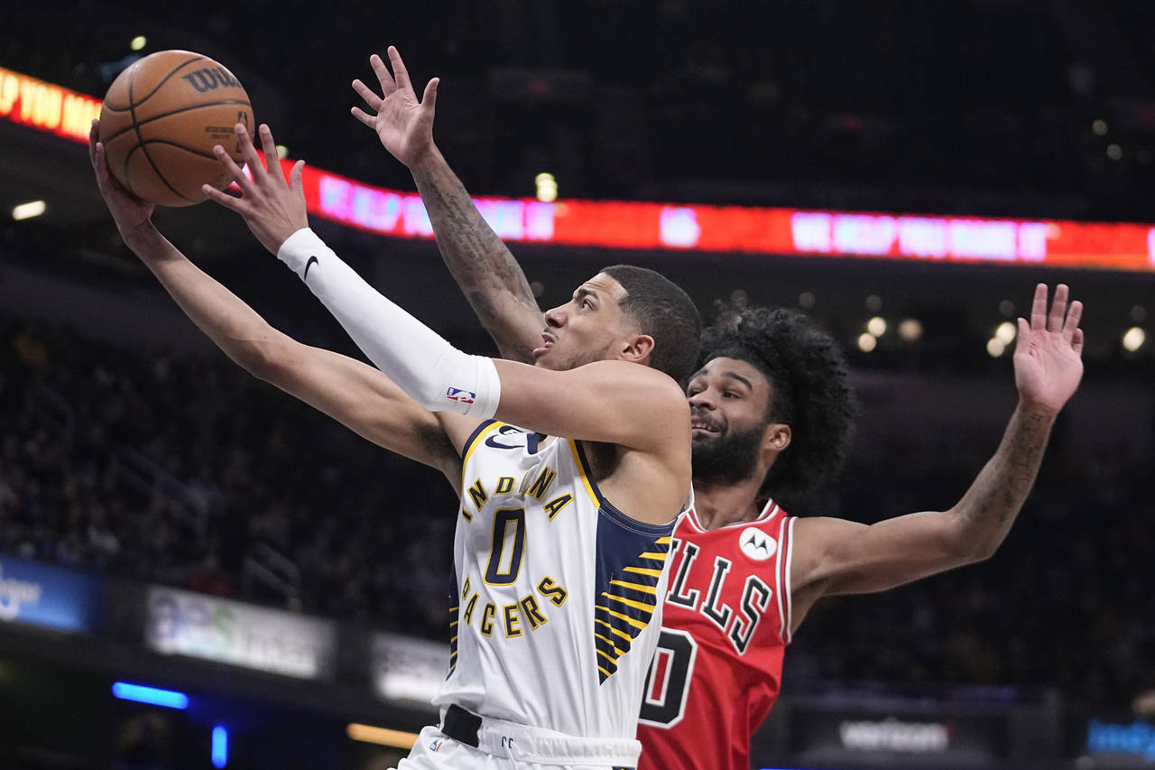 Indiana Pacers guard Tyrese Haliburton (0) shoots against Chicago Bulls guard Coby White during the...