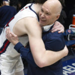 
              Saint Mary's head coach Randy Bennett, right, gets a hug from guard Alex Ducas (44) after notching his 500th career coaching victory, with a 68-59 victory over San Francisco in an NCAA college basketball game, Thursday, Feb. 2, 2023, in Moraga, Calif. (AP Photo/D. Ross Cameron)
            