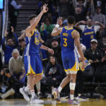 
              Golden State Warriors guard Jordan Poole (3) celebrates with Klay Thompson, left, after scoring a 3-point basket against the Houston Rockets during the first half of an NBA basketball game in San Francisco, Friday, Feb. 24, 2023. (AP Photo/Godofredo A. Vásquez)
            