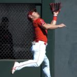 
              Los Angeles Angels' Mike Trout makes a running catch on a ball hit by San Francisco Giants' Brian Bannister during the second inning of a spring training baseball game Monday, Feb. 27, 2023, in Tempe. (AP Photo/Morry Gash)
            