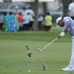
              Justin Suh hits from the 16th fairway during the second round of the Honda Classic golf tournament, Friday, Feb. 24, 2023, in Palm Beach Gardens, Fla. (AP Photo/Lynne Sladky)
            