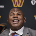 
              Eric Bieniemy talks after be introduced as the new offensive coordinator and assistant head coach of the Washington Commanders during an NFL football press conference in Ashburn, Va., Thursday, Feb. 23, 2023. (AP Photo/Luis M. Alvarez)
            