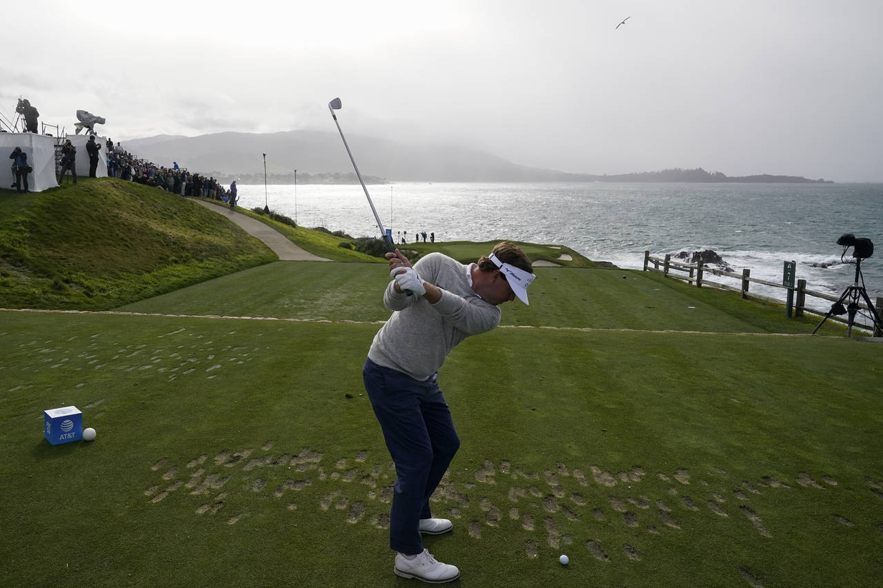Keith Mitchell prepares to hit a drive on the 7th tee of the Pebble Beach Golf Links during the thi...