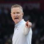 
              Golden State Warriors head coach Steve Kerr gestures during the first half of an NBA basketball game against the Los Angeles Clippers Tuesday, Feb. 14, 2023, in Los Angeles. (AP Photo/Mark J. Terrill)
            
