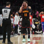 
              Atlanta Hawks guard Trae Young (11) reacts after being called for a foul during the first half of an NBA basketball game against the Washington Wizards Tuesday, Feb. 28, 2023, in Atlanta. (AP Photo/John Bazemore)
            