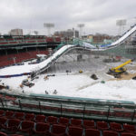 
              FILE — A ramp constructed for the Big Air at Fenway skiing and snowboarding U.S. Grand Prix tour event is covered in snow at Fenway Park, Feb. 10, 2016, in Boston. Fenway Park has kept busy in the offseason with hockey, football and other events that have turned one of baseball's crown jewels into a year-round venue. (AP Photo/Steven Senne, File)
            