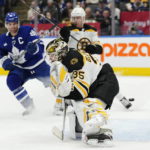 
              Boston Bruins' goaltender Linus Ullmark (35) is scored on by Toronto Maple Leafs' Mitchell Marner (not shown) during the second period of an NHL hockey game, Wednesday, Feb.1, 2023 in Toronto. (Frank Gunn/The Canadian Press via AP)
            